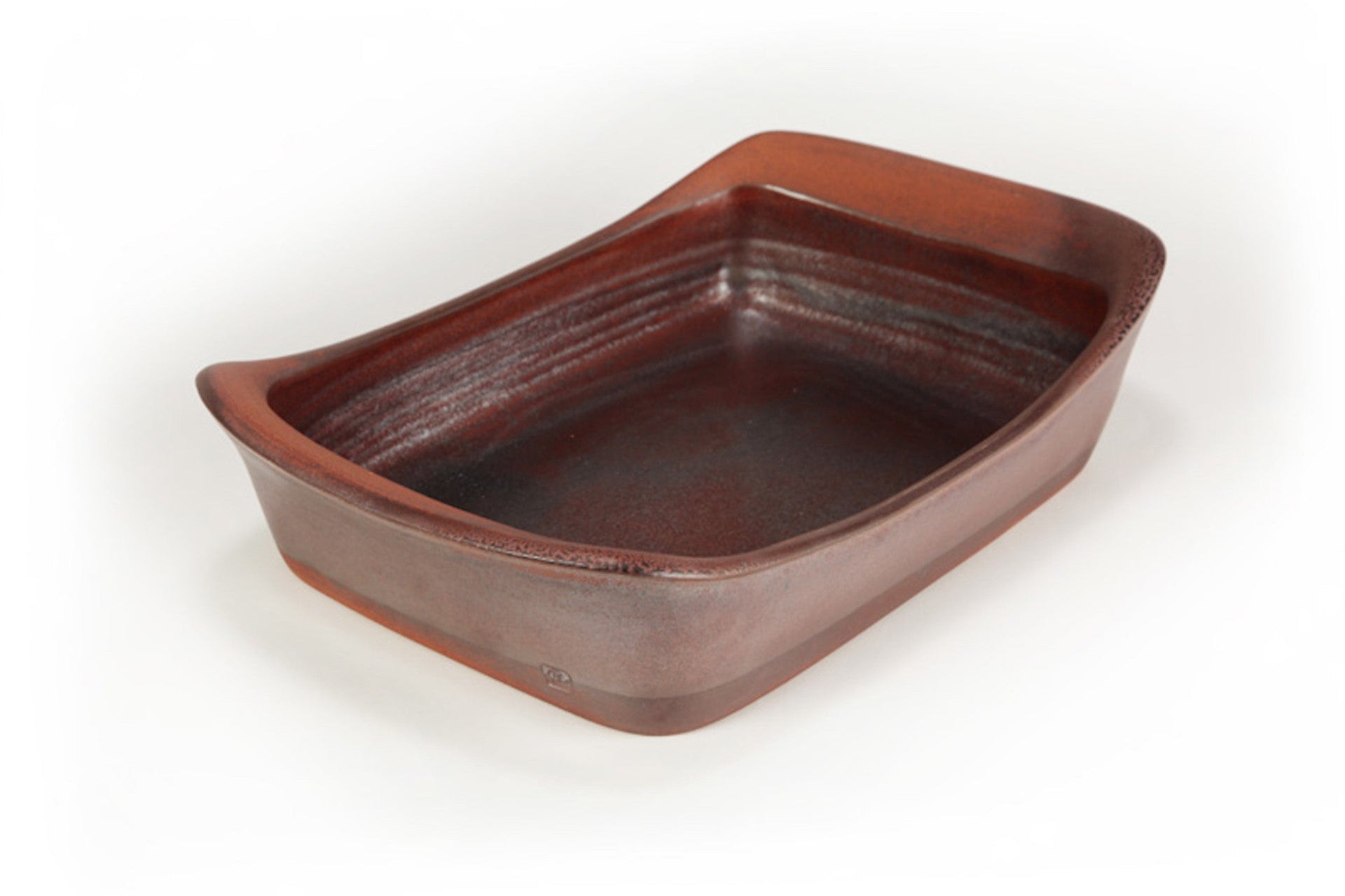 Rectangular brown ceramic dish on a white background